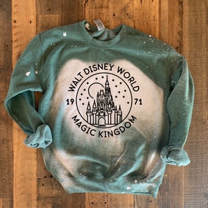 Magic kingdom sweatshirt with bleached washed forest green material. Soft, thick forest sweatshirt.