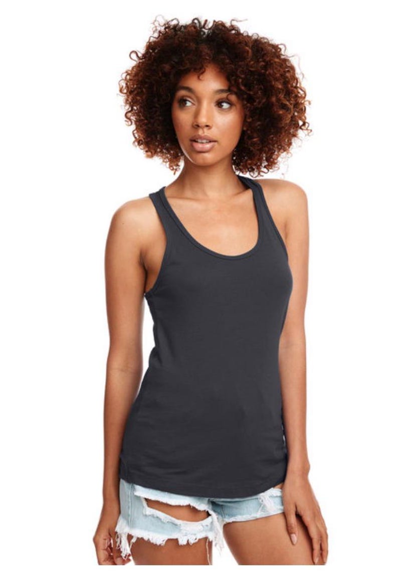 May include: A dark gray racerback tank top with a scoop neck. The tank top is made of a soft, comfortable fabric and has a relaxed fit.