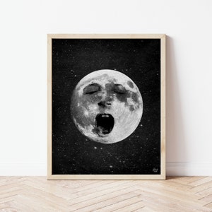 May include: A black and white illustration of a full moon with a human face screaming. The moon is surrounded by a field of stars.
