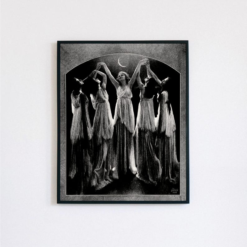 May include: Black and white photograph of five women in long white dresses dancing under a crescent moon. The women are silhouetted against a dark background.