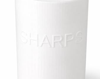 May include: A white cylindrical container with a matching lid. The word "SHARPS" is embossed on the side. The container is designed for the safe disposal of medical sharps.