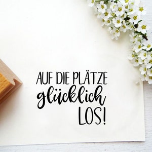 Stempeltext "auf die Plätze glücklich los" für Geschenke und Karten zur Motivation