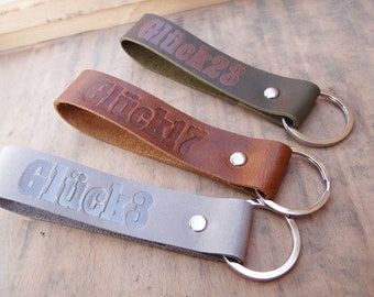 "Happiness" keychain made of leather