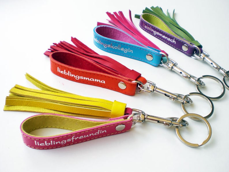 Leather keychain with text of your choice and tassel image 1