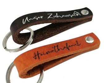 small, robust key fob made of thick leather with text of your choice