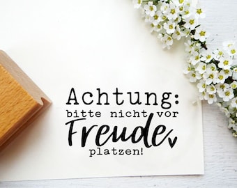 Stempel "Achtung: bitte nicht vor Freude platzen"