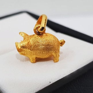 Gold store pig necklace