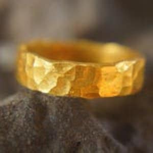 19.5 grams 8mm wide   99.9% pure 24k gold ring