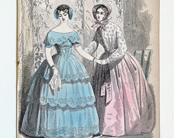 May include: Two women in a garden setting. The woman on the left is wearing a light blue dress with lace trim and a white collar. The woman on the right is wearing a pink dress with a white floral pattern and a white bonnet.