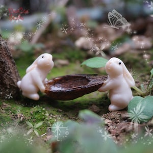 Niedliche Häschen-Fee-Miniatur-Serie, weißes Di-Rabbit tragen Nussboot, Mini-Fee-Garten-Versorgungen Sukkulenten Terraium DIY Zubehör