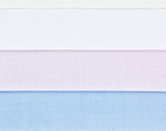 May include: A close-up of a fabric swatch with three horizontal stripes. The top stripe is white, the middle stripe is light pink, and the bottom stripe is light blue.
