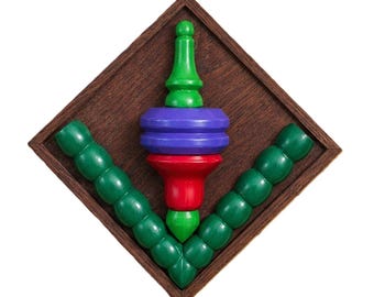 SPINNING TOP - original wood wall sculpture by George Troyanov
