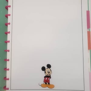 May include: A white page with a black border, featuring a cartoon image of Mickey Mouse in the bottom right corner. Mickey Mouse is wearing his signature red shorts and yellow shoes.