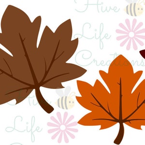 May include: Three autumn leaves in different shades of brown, orange, and red. The leaves are all maple leaves with a classic shape.