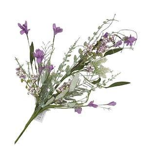 May include: A bouquet of artificial flowers featuring purple blooms and small, round, light purple berries. The arrangement includes green leaves and stems, creating a natural aesthetic. The flowers are set against a white background.