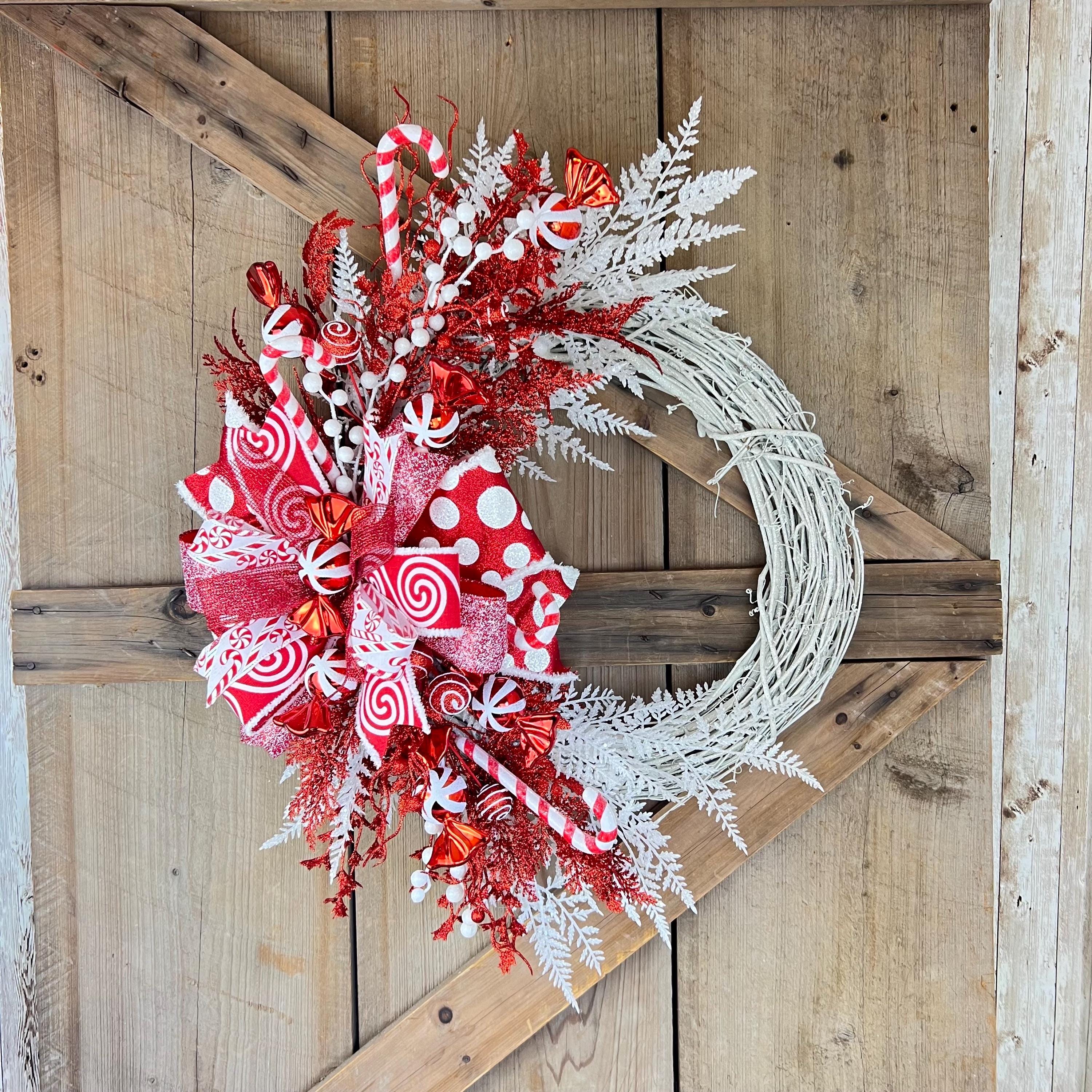 20 Christmas Wreaths for Your Front Door 3 Peppermint Christmas Wreath: White Grapevine, Red Candy Cane Bow