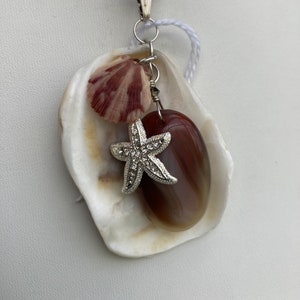 Botswana Agate pendant necklace, a sterling plated Star Fish and sea shells with a sterling silver 1.85mm textured box Italian 925 necklace