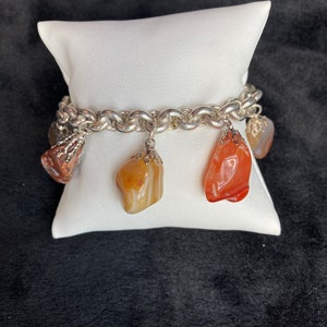 Natural Agate polished stones makes this beautiful handmade earthy Sterling silver charm bracelet