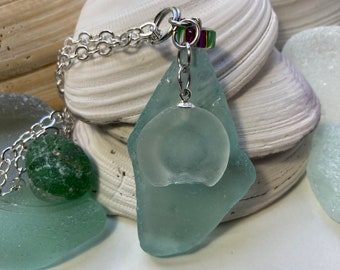 Beach glass pendant necklace made of sea glass on a Sterling Silver plated flat loop chain