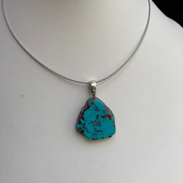 Kingman Arizona, blue turquoise pendant with Sterling silver bail on a cable neck wire necklace