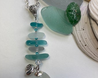 Beach glass pendant necklace made of blue sea glass on a Sterling Silver plated flat loop chain