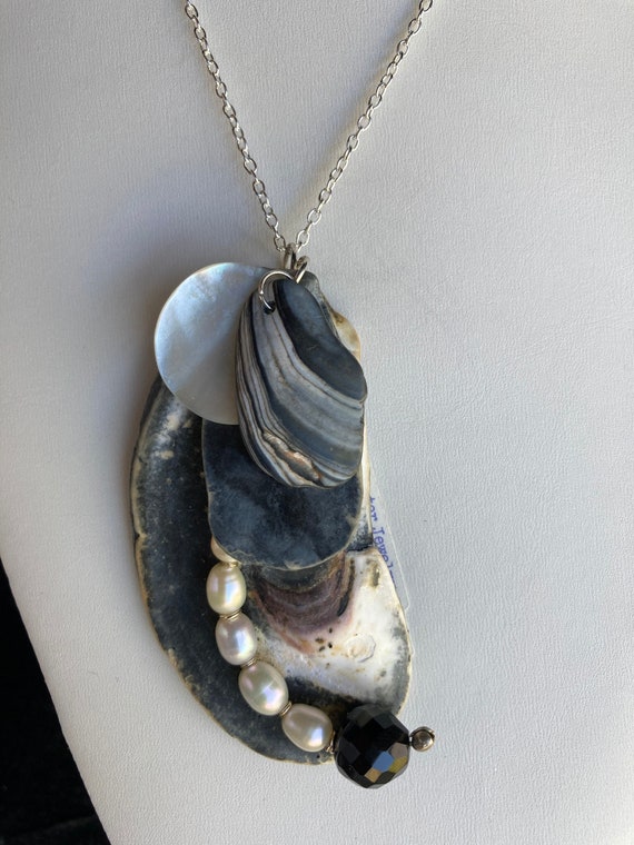 black cord necklace conch shell pendant