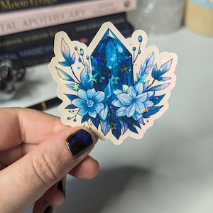 Blauwe kristallen met bloemen Witte sticker met holografische ster glans enkelvoudig Mystical