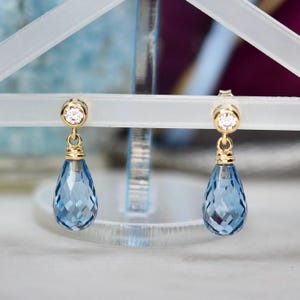 14カラットゴールドの合成スピネルブリオレットイヤリング