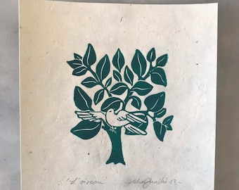 May include: A green and white print of a bird in a tree. The print is signed "L'oiseau" and "Mary Jane Chi 23".