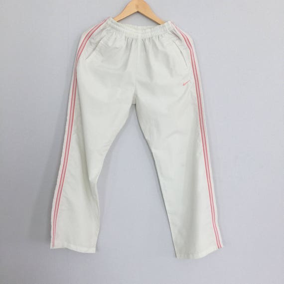 nike tracksuit pink stripe