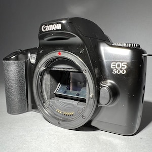 Canon EOS 500 SLR film camera body only - with FREE 35mm roll of film!