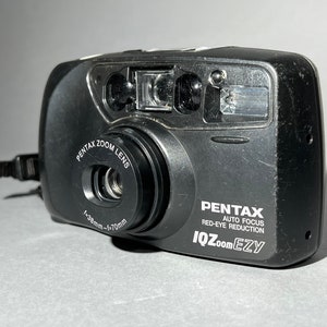 Pentax IQZoomEZY point and shoot 35mm camera with FREE roll of film included! Tested and working