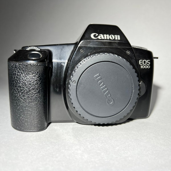 Appareil photo Canon EOS 1000 SLR 35mm avec rouleau de film GRATUIT inclus! Corps seul, testé et fonctionnel