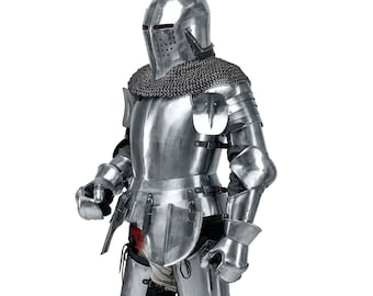 May include: A complete set of polished steel armour, featuring a helmet with eye slits and a chainmail collar. The armour covers the torso, arms, and legs, with articulated joints. The medieval-style armour is designed for protection.