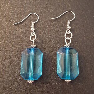 Blue acrylic crystal beaded drop dangle earrings with silver detail