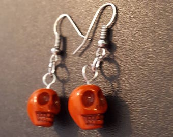 Orange acrylic skull beaded drop dangle earrings with silver detail