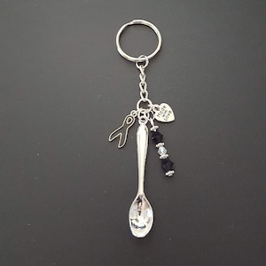 Black Spoonie Support ribbon keychain - Awareness for Melanoma, Narcolepsy, Sleep Apnea, POW-MIA, Primary Billary Cirrhosis, Sleep disorders