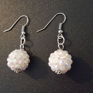 White shamballa earrings w/ silver detail