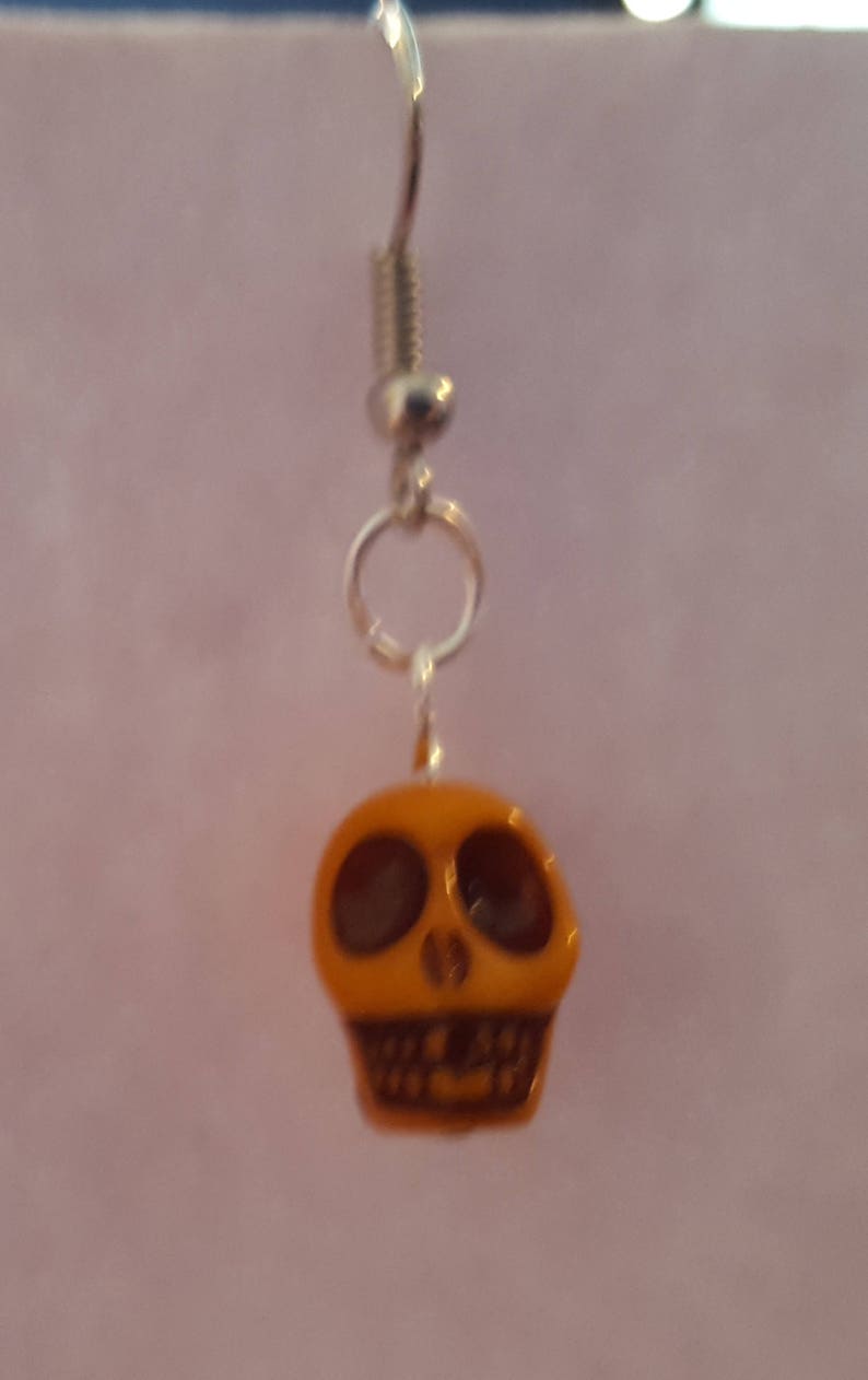 Yellow acrylic skull beaded drop dangle earrings with silver detail image 2