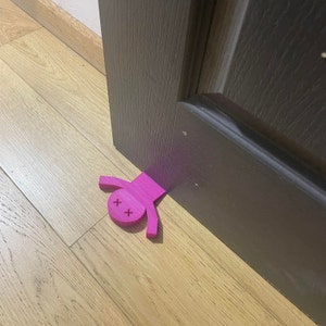 Rolig avtagbar dörrstopp/dörrkil