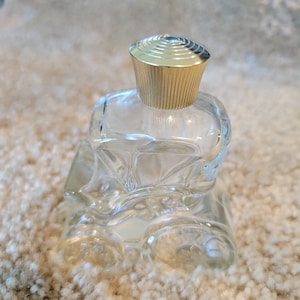 Vintage Avon cologne bottle clear glass gold cap old-time carriage shape used to contain field flowers cologne