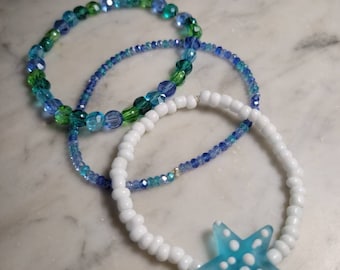 Beaded stretch  bracelets aqua blue and green starfish set of three handmade
