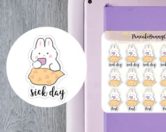 Puede incluir: Una hoja de 16 pegatinas con un conejito de dibujos animados en una manta con el texto "sick day" y "rest".