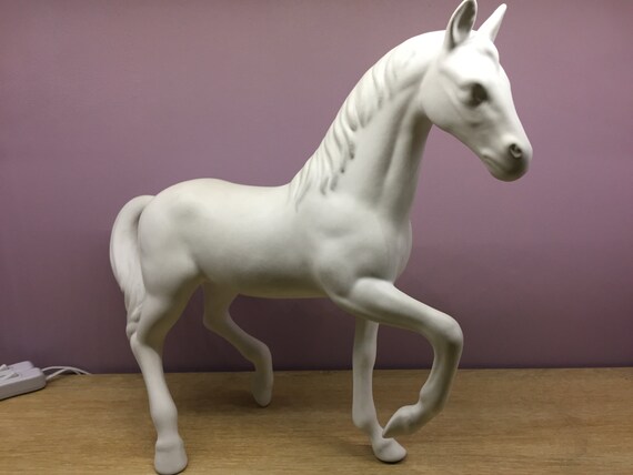 white porcelain horse statue