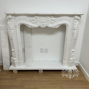 Marble Carved Fireplace Mantel