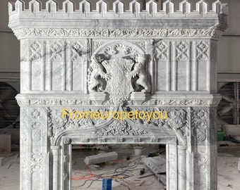 May include: A white marble fireplace mantel with intricate carvings and a crest featuring two lions. The mantel has a tall, arched opening and a decorative base.