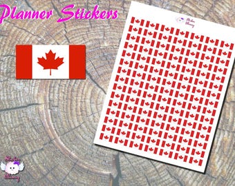 May include: A sheet of planner stickers featuring a repeating pattern of the Canadian flag. Each sticker is a small, red and white version of the Canadian flag with a red maple leaf in the centre.