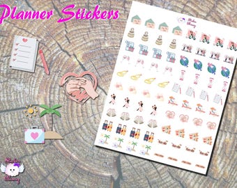 May include: A sheet of planner stickers featuring a wedding theme. The stickers include images of wedding rings, cake, champagne flutes, suitcases, palm trees, and the text "to-do".