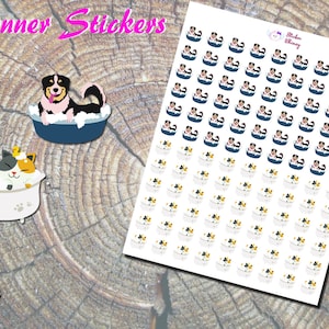 May include: A sheet of planner stickers featuring a dog and a cat taking a bath. The stickers are in a cartoon style and are perfect for adding a touch of whimsy to your planner.