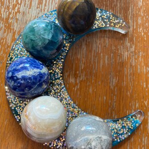 Resin moon, resin shot glass, candle, or sphere holder!